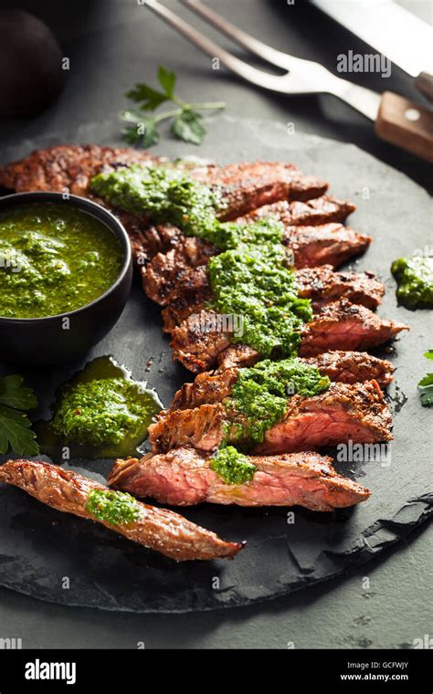 Homemade Cooked Skirt Steak With Chimichurri Sauce And Spices Stock