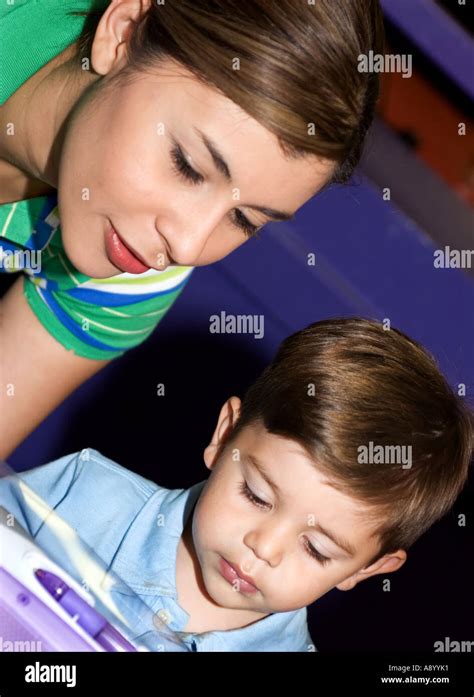 Mother and son at birthday party Stock Photo - Alamy