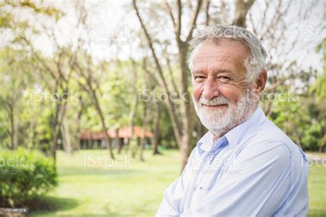 portrait  healthy happy senior caucasian  man   park outdoors