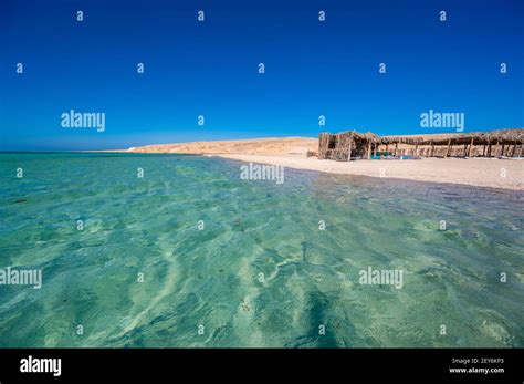 Orange Bay With White Beach And Crystal Clear Azure Water Paradise