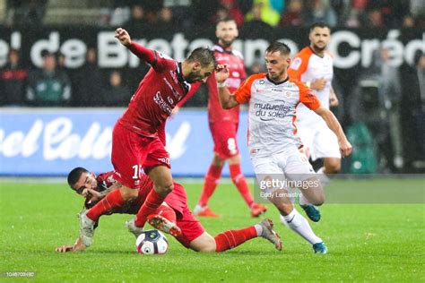 Guingamp X Montpellier - Nicolas Benezet of Guingamp and Ruben Aguilar of Montpellier during ...