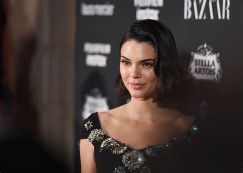 Kendall Jenner Poses In Leopard Print Thong Bikini