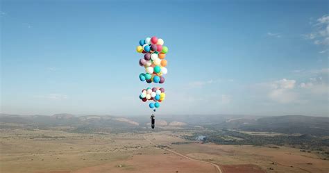 Man Strapped To Helium Balloons Flies Feet Up In The Air