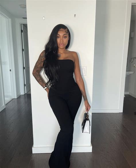Jania Meshell Strikes a Pose in Fashion Nova Black Tube Lace-Up