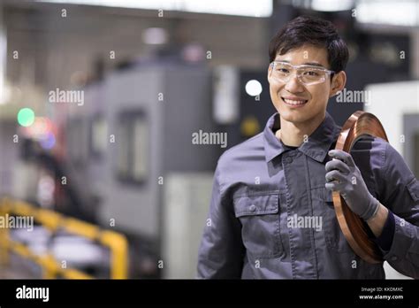 Confident Chinese Engineer In The Factory Stock Photo Alamy