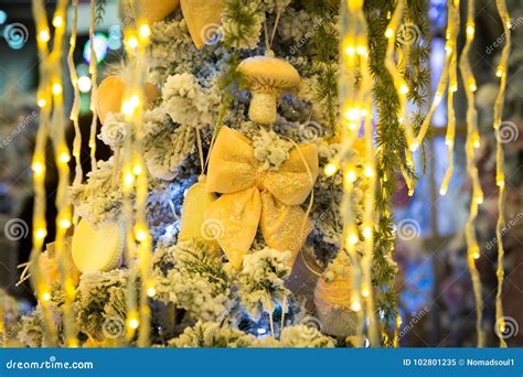 Christmas Tree with Yellow Decor and Lights Stock Image - Image of gift ...