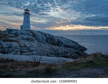 Peggys Cove Lighthouse Sunset Peggys Cove Stock Photo 1558989092 ...