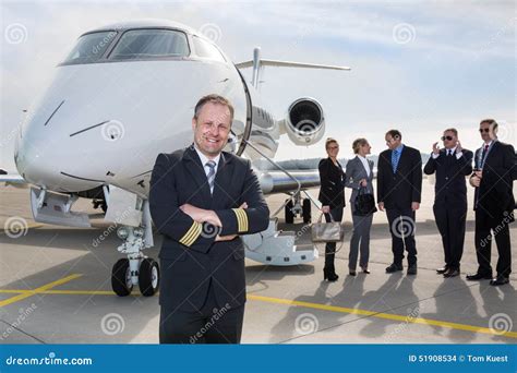 Pilot Standing In Front Of Corporate Private Jet Stock Photo Image Of