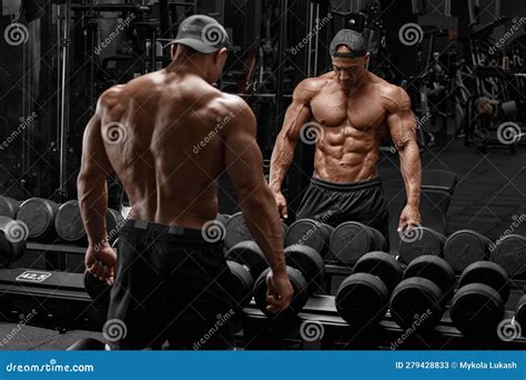 Muscular Man In Gym Showing Muscles In The Mirror Strong Male Naked