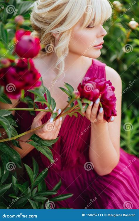 Outdoor Close Up Portrait Of Beautiful Young Woman In The Blooming