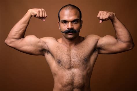 Premium Photo Portrait Of Muscular Indian Man With Mustache Shirtless