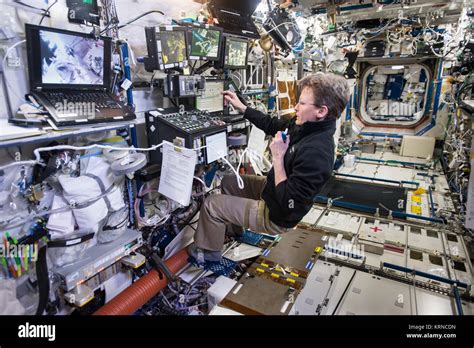 ISS-50 EVA-3 (c) Peggy Whitson controls the robotic arm in the Destiny ...