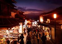 Matsubara Dori Street In Kyoto At Night With Brightly Lit Souvenir