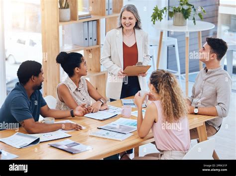 Female Leadership Teamwork And Planning During A Meeting To Explain