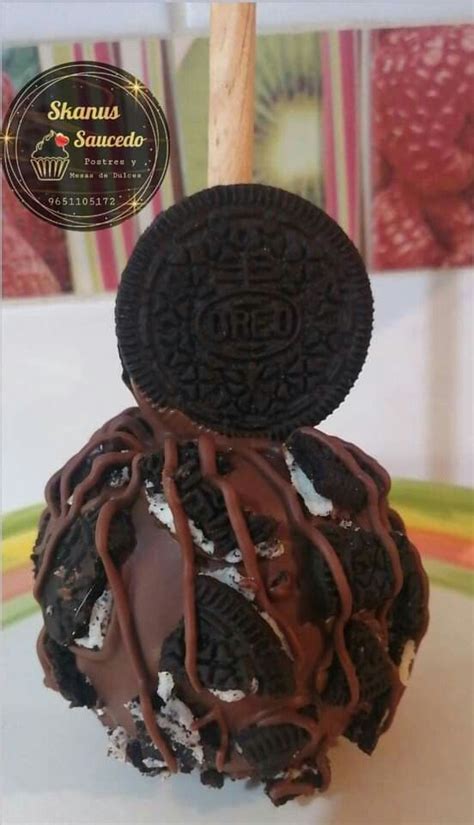 An Oreo Cookie Ice Cream Ball On A Plate