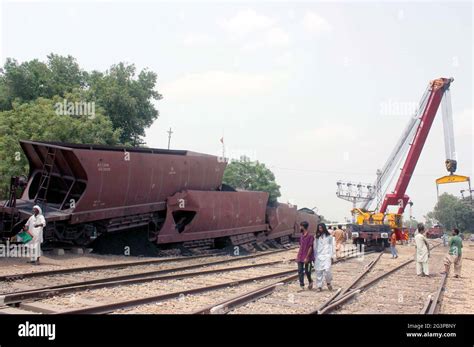 workers  machineries  railway department busy  rescue operation