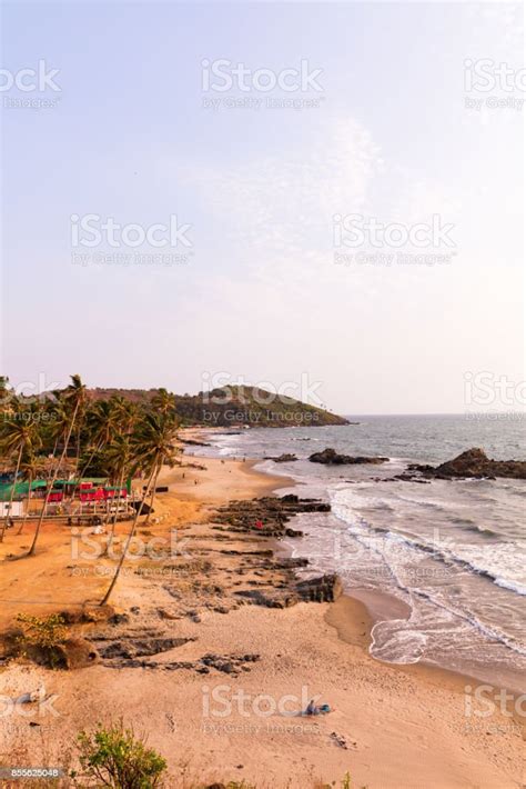 Vagator And Ozran Beach At Sunset Stock Photo - Download Image Now ...