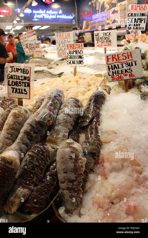 Seafood displayed at Pike Place Fish Co. at Pike Place Market in ...