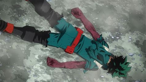 An Anime Character Laying On The Ground With His Head Down And Hands In