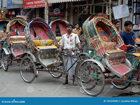 Dhaka, Bangladesh: a Rickshaw Driver Waits in Line Editorial Stock ...