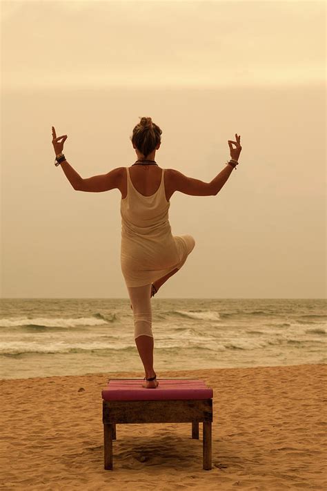 Girl Doing Yoga At Sunset On The Beach Photograph By Mauro Ladu Fine Art America