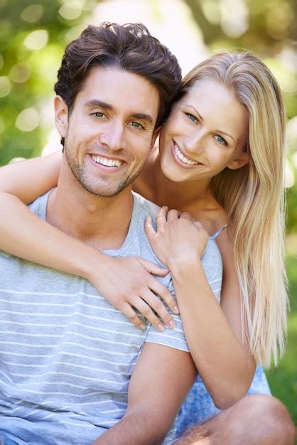 Premium Photo Couple Hug And Portrait In Park With Smile Love And