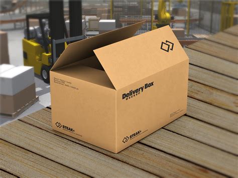 Free Cardboard Packaging Delivery Box Mockup PSD Designbolts