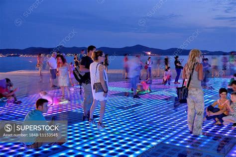 People At The Monument To The Sun Pozdrav Suncu By Architect Nikole