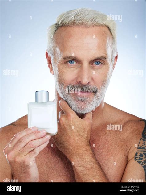 Old man, portrait and confident, face with cologne and grooming ...