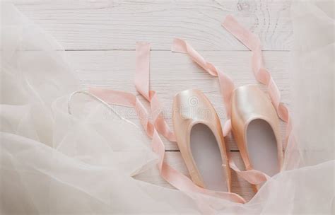 Pink Ballet Pointe Shoes And Tutu On White Wood Background Stock Image