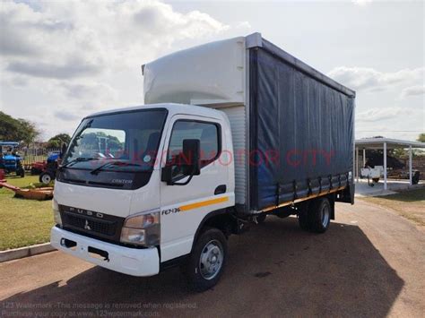 Mitsubishi Fuso Canter Fe Fitted With Tautliner Body For Sale In