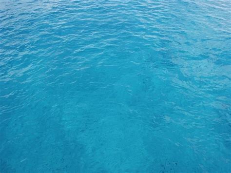 Deep Blue Ominous Ocean Water Background — Stock Photo © Feverpitch #2356872