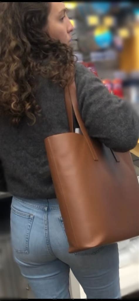 St Post Curly Hair Ass In Jeans Using The Computer Tight Jeans Forum