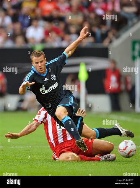 Schalke S Lukas Schmitz Front Goes Down After Fighting For The Ball