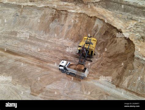 Largest Mining Excavator With Electric Shovel Loading Sand Into Dump