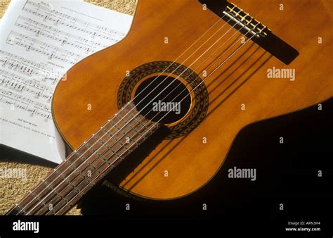 Classical Guitar And Sheet Music Stock Photo Alamy