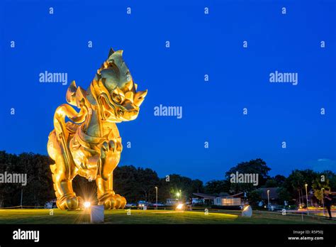 CHIANG RAI THAILAND OCT 27 2016 Gold Singha Statue At Singha Park Is