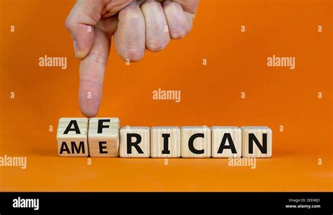 African American Symbol Businessman Turns Wooden Cubes With Words