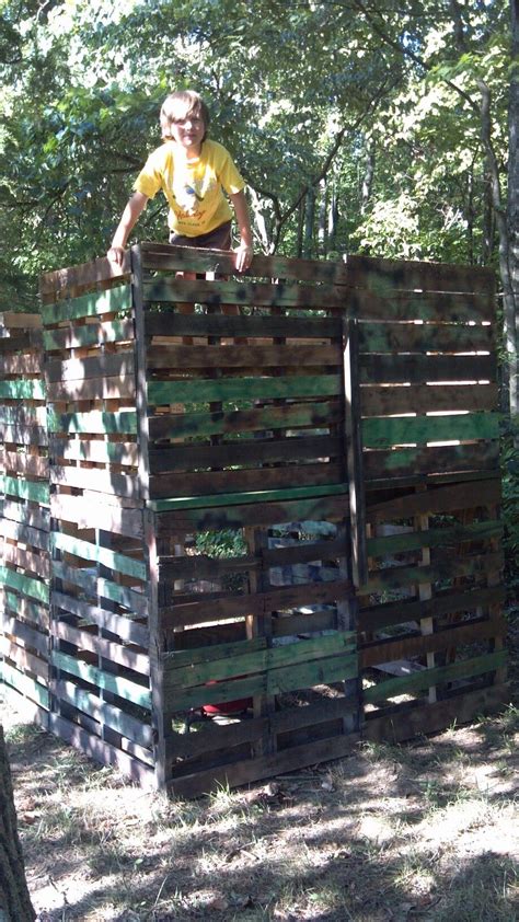 Two Story Play Fort Built From Pallets Gaps In Wood Are Perfect To