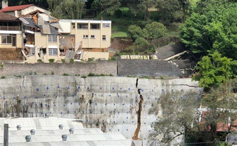 Colapsó muro de contención y una vivienda enruta a Muxbal Chapin TV