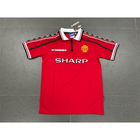 Jual SPONSOR VELVET JERSEY RETRO MU HOME 1999 TREBLE WINNER GRADE ORI