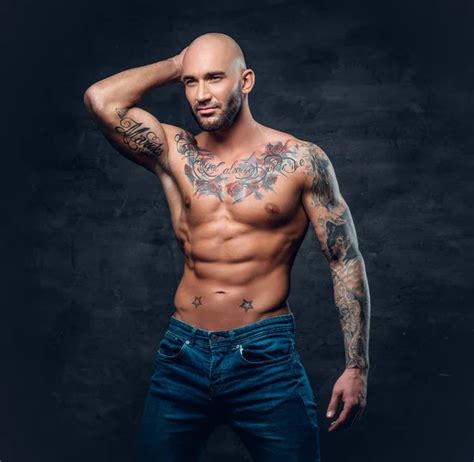 Muscular Man With Tattoos On Torso Stock Photo By Fxquadro 150772308