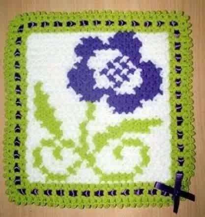 Crocheted Square With Purple Flower And Black Cross