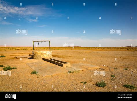 Waterhole For Camel Caravans In The Reg Desert Sahara Morocco Stock