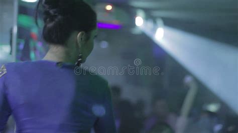 Pretty Brunette Dancing At Club In Flashing Light Camera Flirt Stock