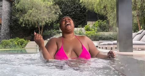 Lizzo Praised By Fans As She Oozes Confidence In Pink Bikini At