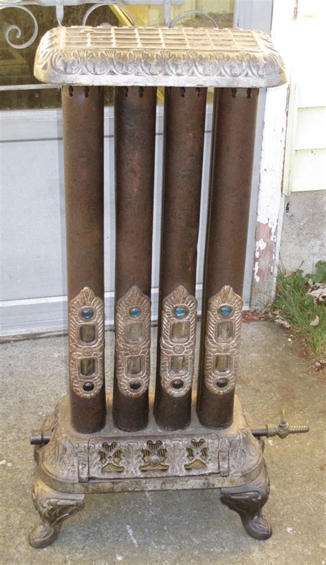 Antique 4 Stor Cast Iron Jeweled And Mica Victorian Stove Heater 31