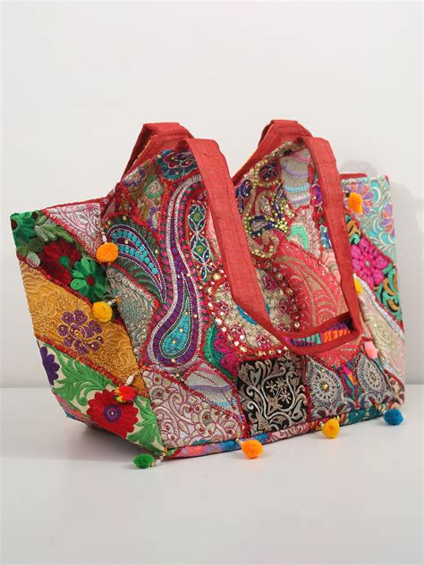 Shoulder Bag From Kutch With Floral Embroidery And Pom Poms Exotic