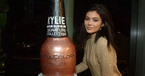 Kylie Jenner Covers Up In Gold Dress After Lounging Poolside In Tiny Bikini Irish Mirror Online