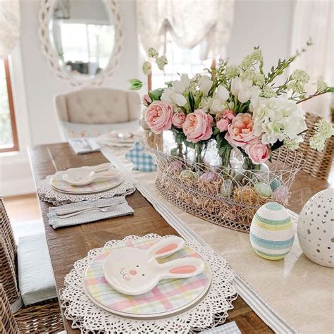 A Dining Room Table Set For Easter With Flowers In Vases And Plates On